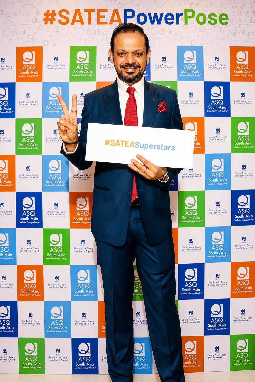 MAGICX founder Pradeep Kumar holding an ASQ South Asia #SATEASuperstars sign
