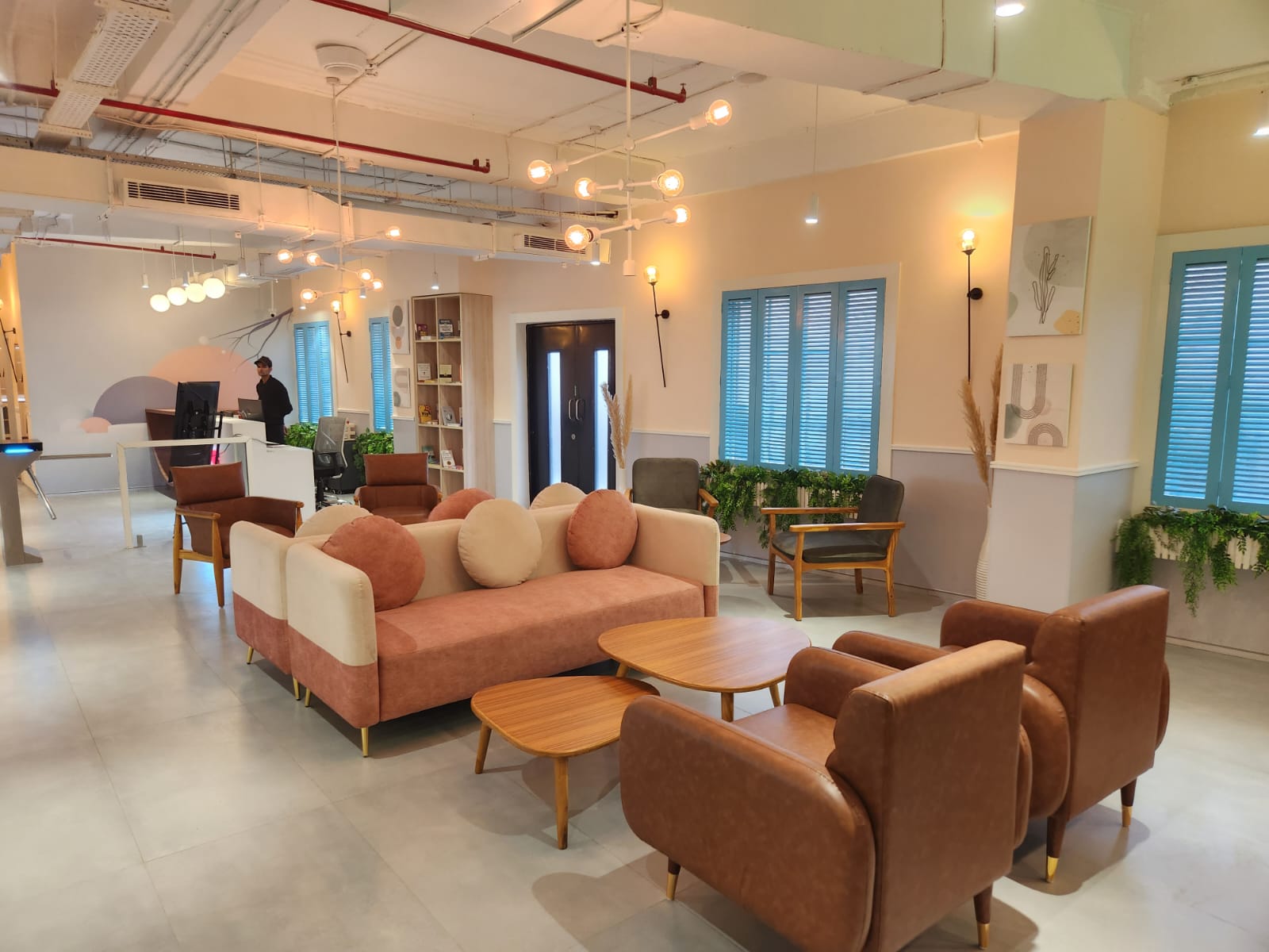 MAGICX training room lounge area with cozy sofas and armchair seating